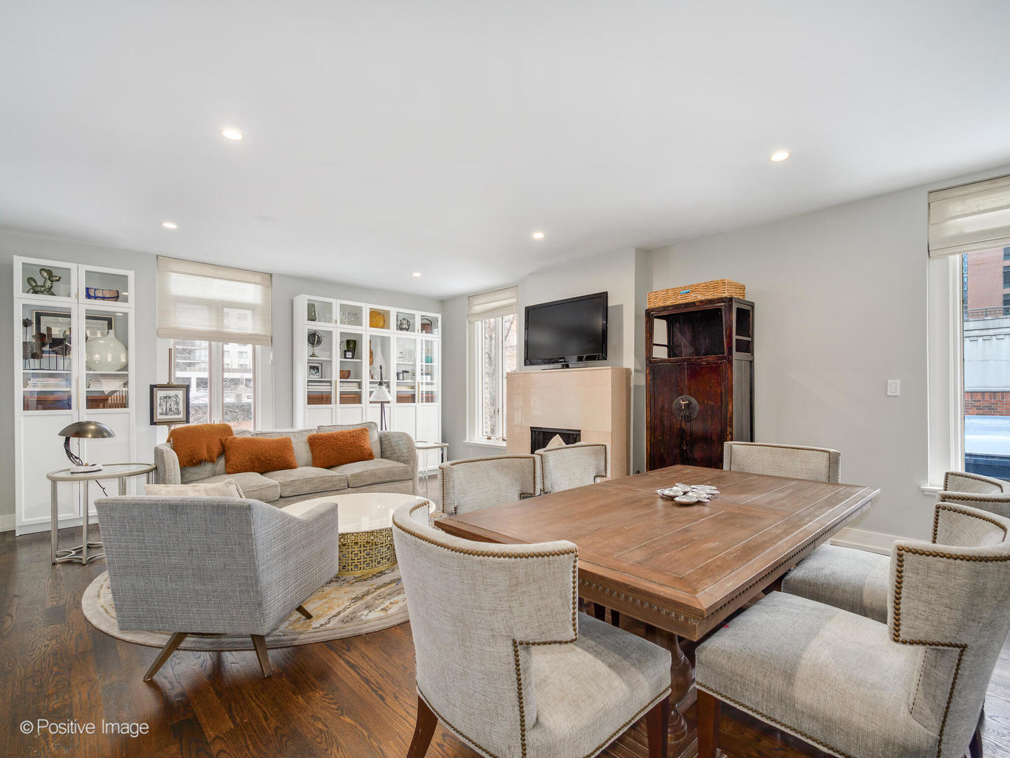 839 North Dearborn Street, Unit F Chicago, IL 60610 - Photo 5 of 40 a living room with fireplace furniture and a table