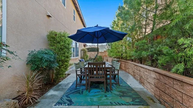 a view of two chairs in patio