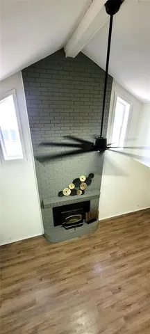 a view of entryway and kitchen