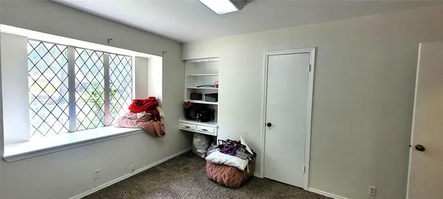 a room with toys and a window