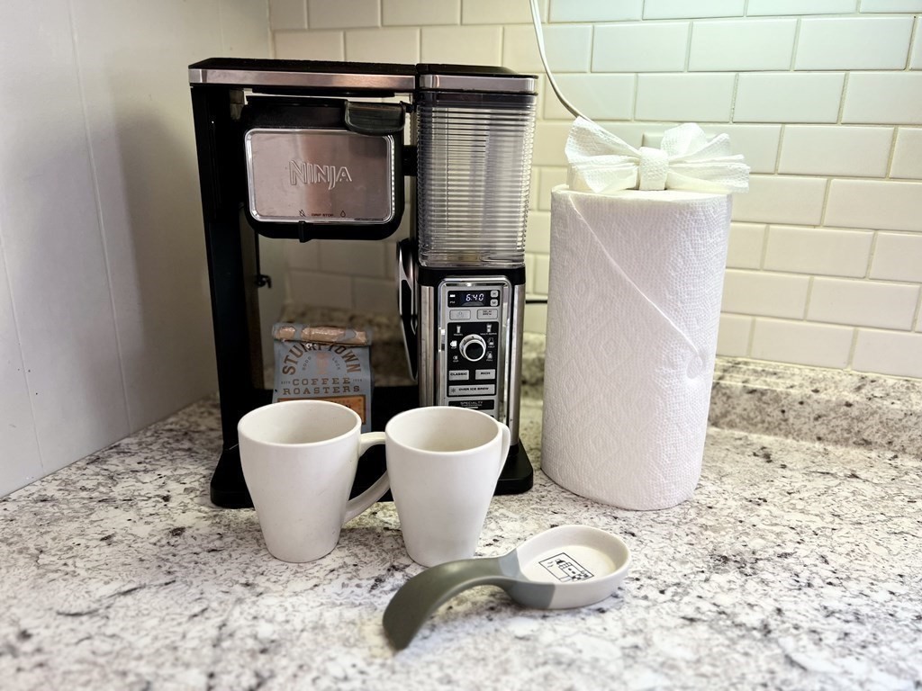 135 Balsam Street Fairhaven, MA 02719 - Photo 18 of 39 a bathroom with a sink a toilet and a mirror