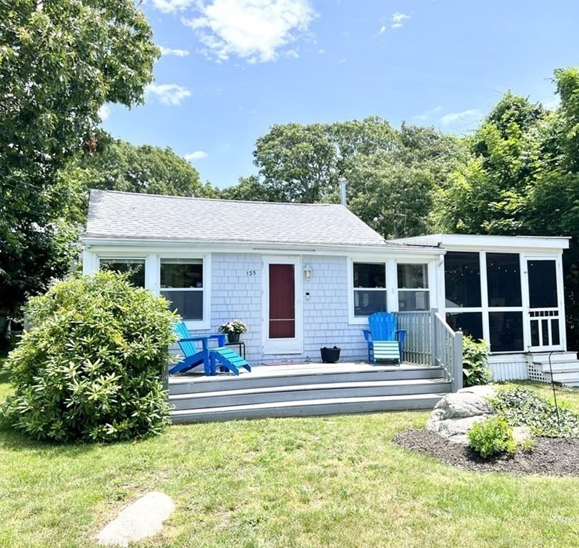 135 Balsam Street Fairhaven, MA 02719 - Photo 2 of 39 a front view of a house with a yard