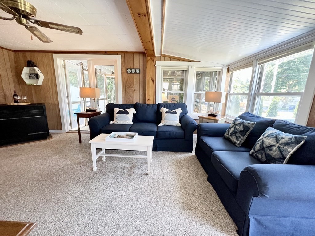 135 Balsam Street Fairhaven, MA 02719 - Photo 3 of 39 a living room with furniture and a large window