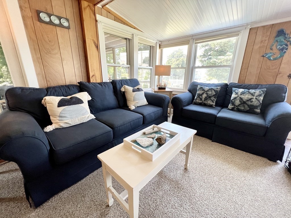 135 Balsam Street Fairhaven, MA 02719 - Photo 4 of 39 a living room with furniture and a large window