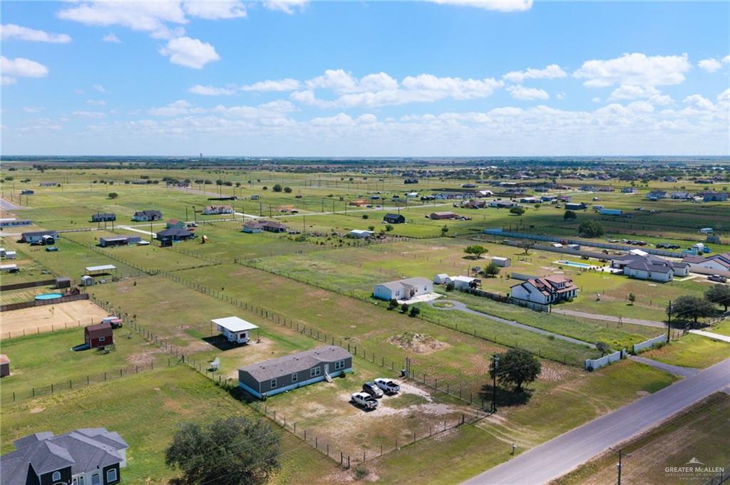 9510 Mile 20 Road Monte Alto, TX 78538 - Photo 8 of 13 an aerial view of a houses with a lake view