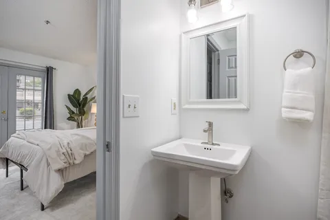 a bathroom with a sink and a mirror