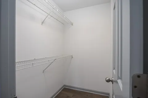 a view of a room with racks on the wall