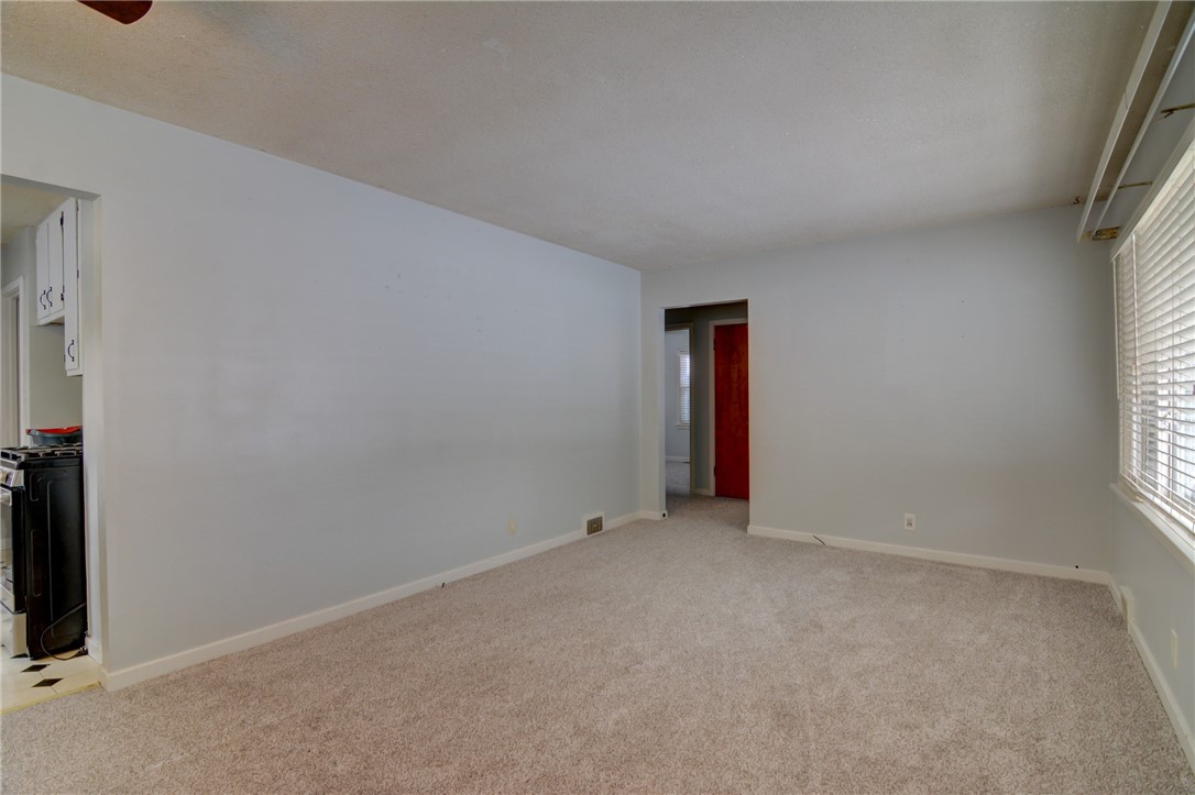 47 1st South Shores Avenue Decatur, IL 62521 - Photo 14 of 24 an empty room with windows