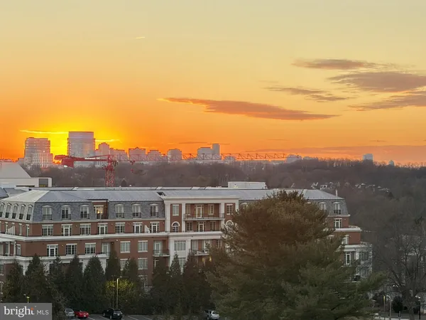 a view of a city with tall buildings