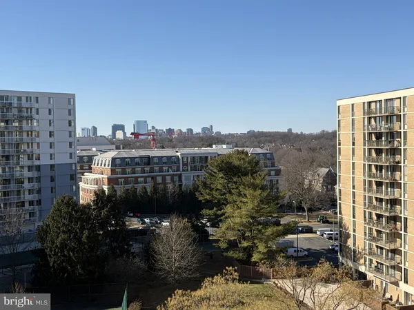a view of a city with tall buildings