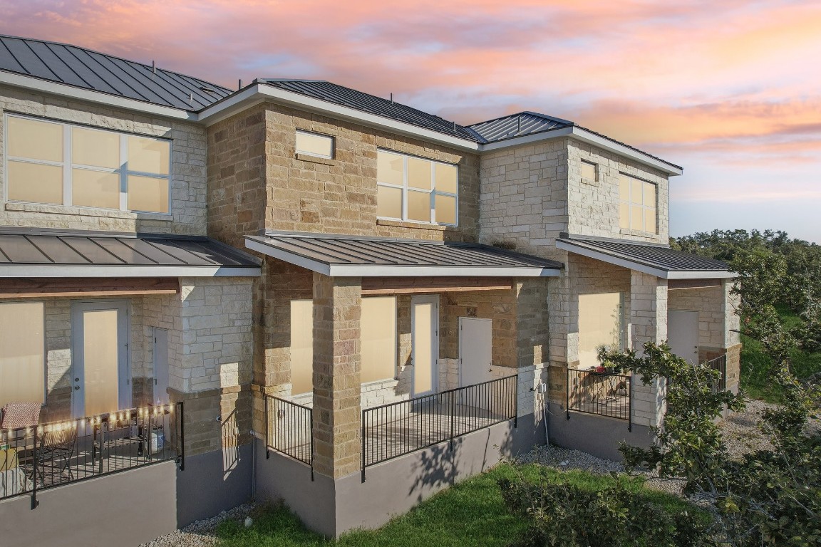 289 Star Grass Spring Branch, TX 78070 - Photo 2 of 39 a front view of a house with a yard
