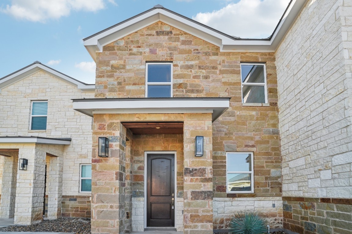 289 Star Grass Spring Branch, TX 78070 - Photo 5 of 39 a front view of a house with glass windows