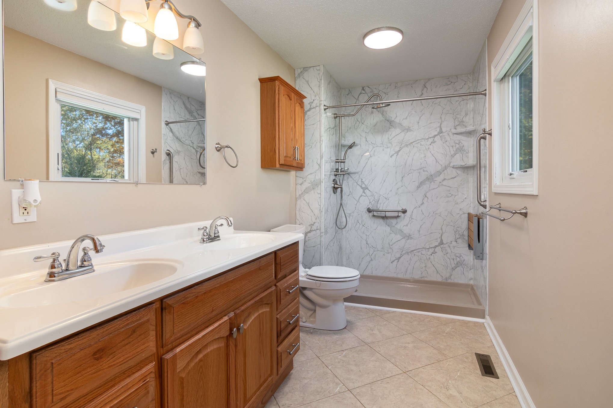 3289 Backridge Road Woodlawn, TN 37191 - Photo 17 of 30 a bathroom with a sink toilet and shower