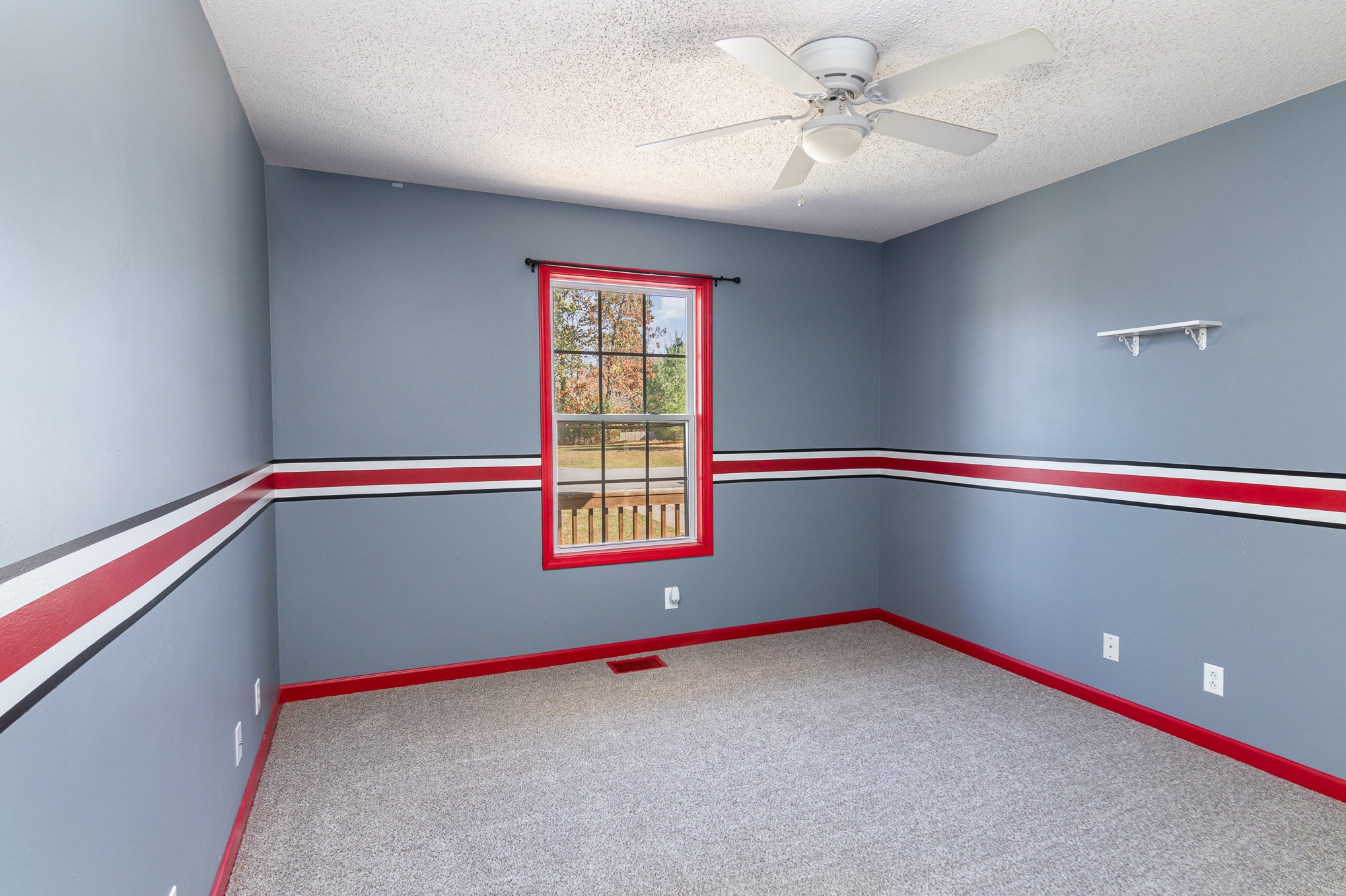 3289 Backridge Road Woodlawn, TN 37191 - Photo 20 of 30 a room with windows and ceiling fan