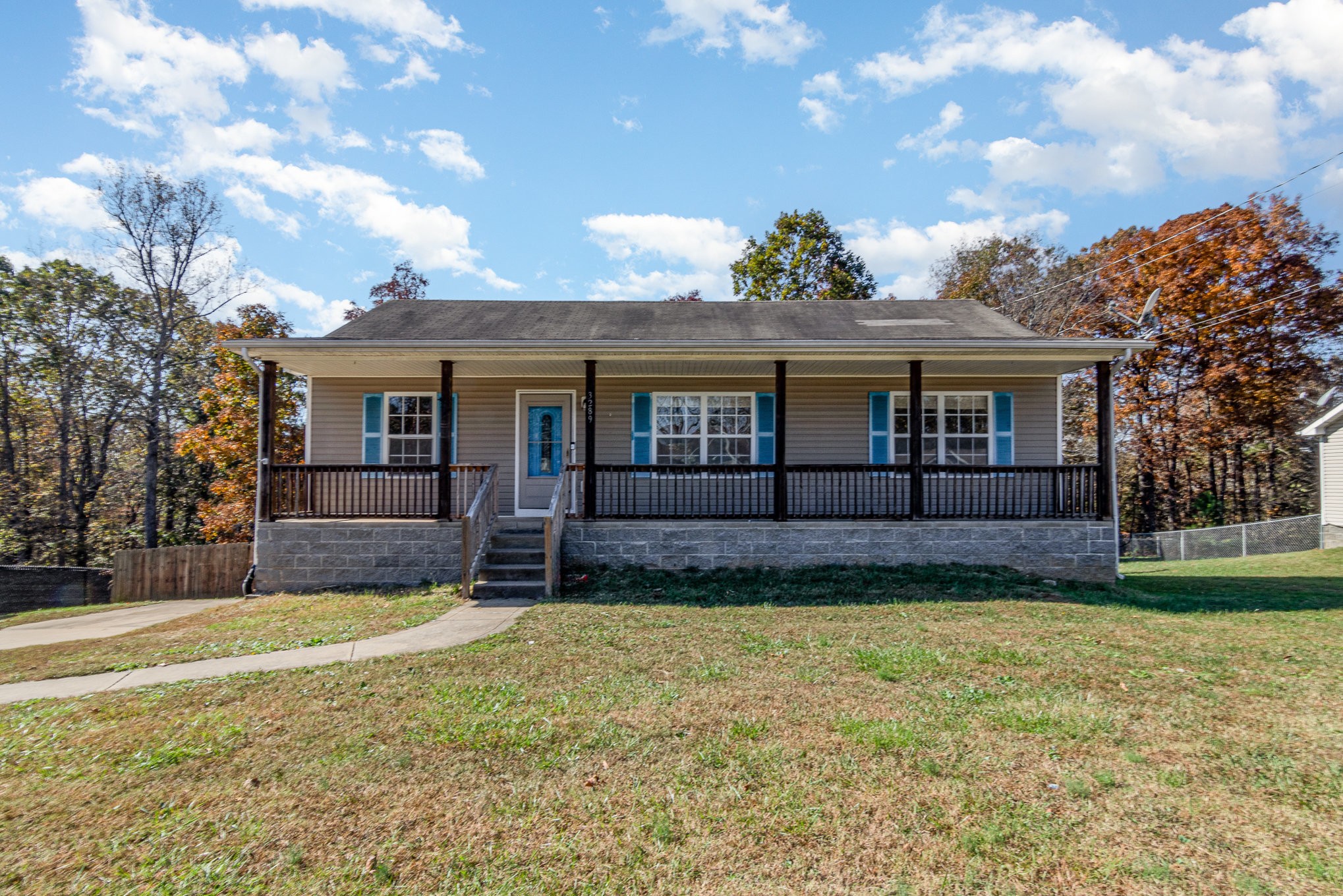 3289 Backridge Road Woodlawn, TN 37191 - Photo 2 of 30 a house view with a garden space