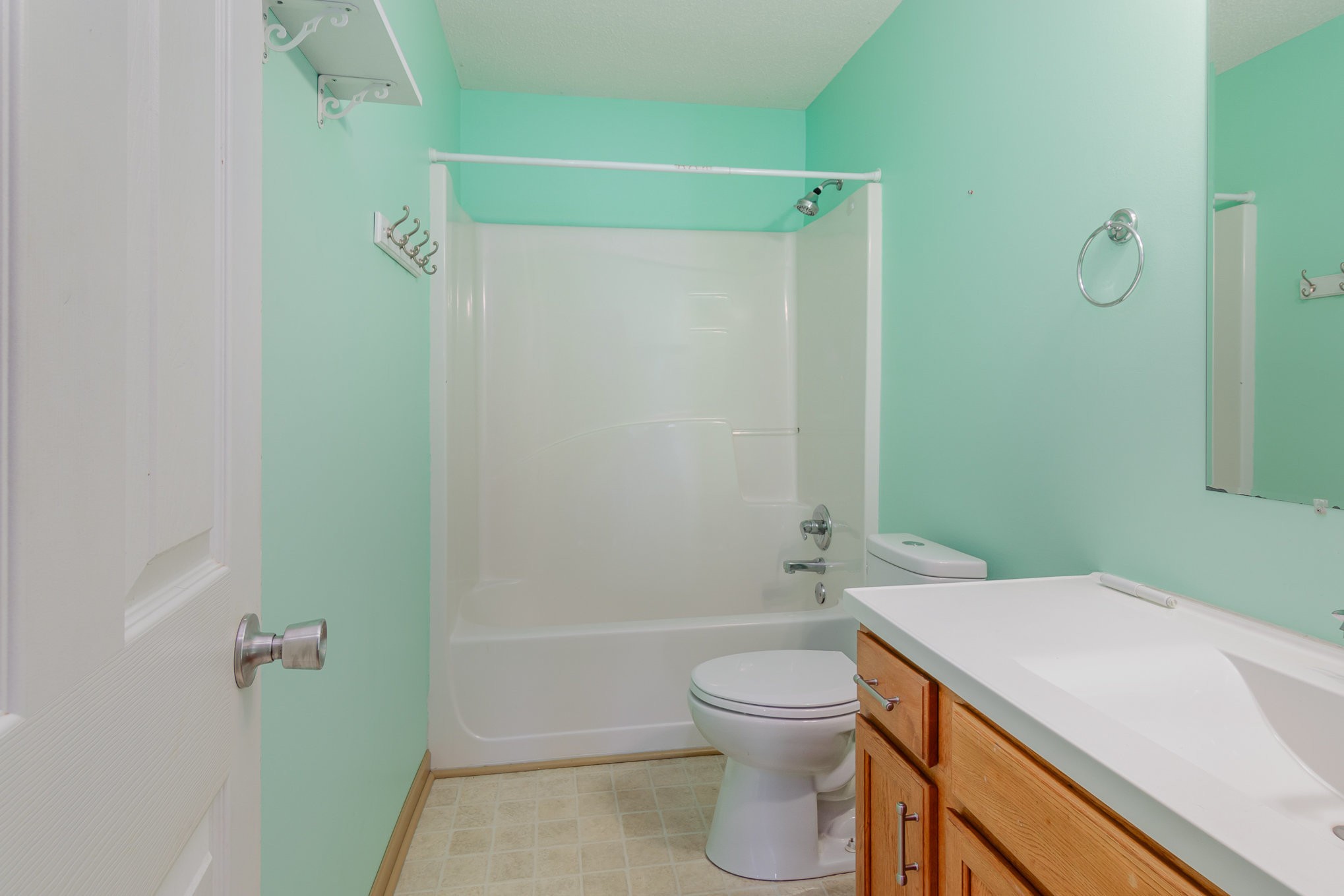 3289 Backridge Road Woodlawn, TN 37191 - Photo 22 of 30 a bathroom with a sink a toilet and shower