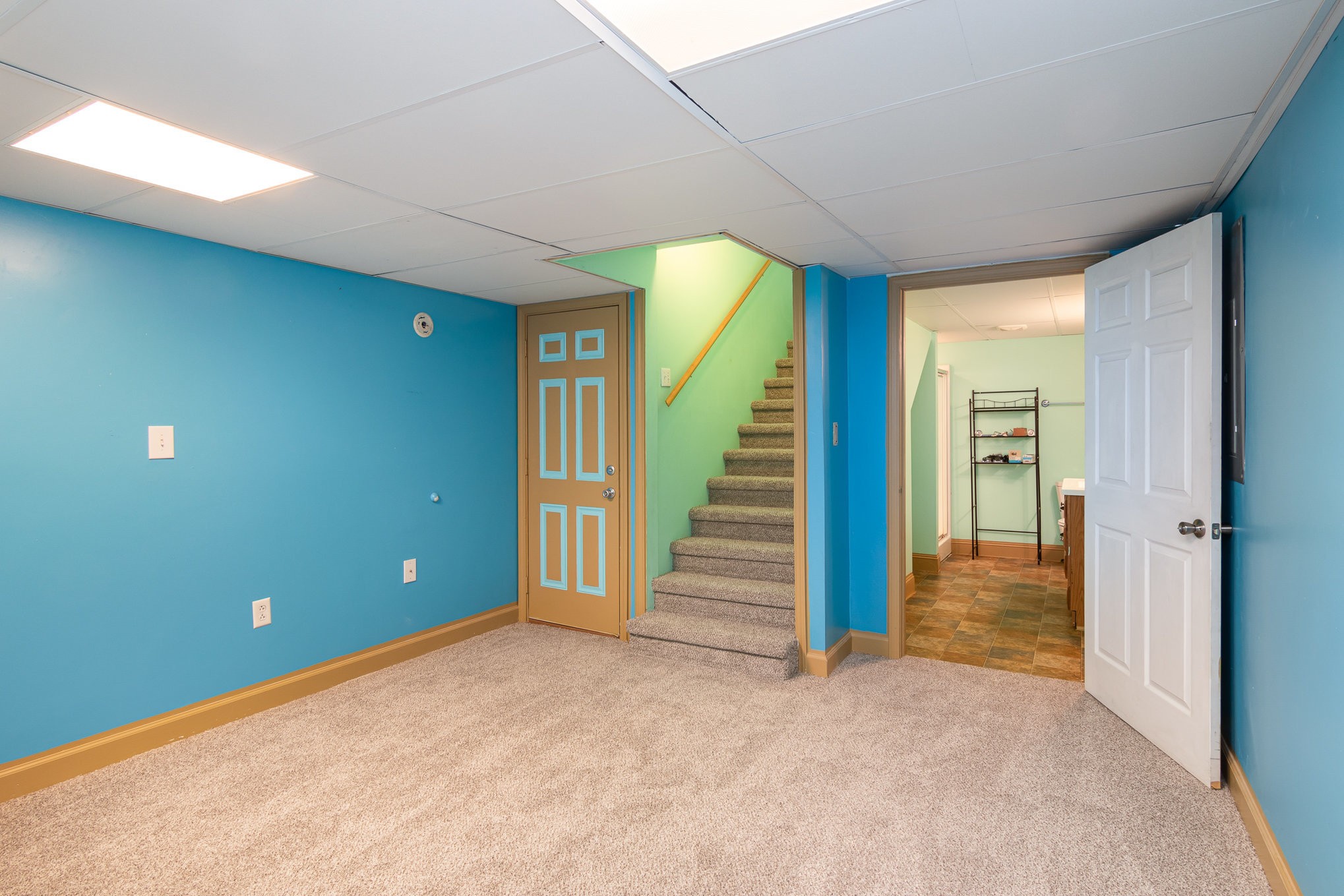 3289 Backridge Road Woodlawn, TN 37191 - Photo 23 of 30 a view of a livingroom with stairs and furniture