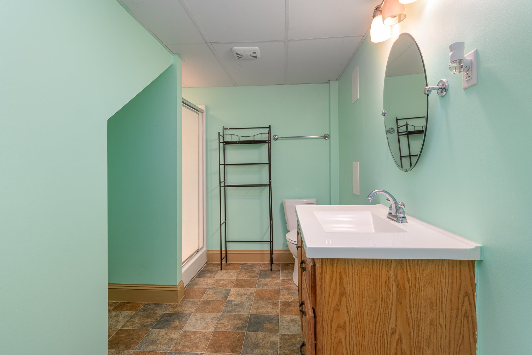 3289 Backridge Road Woodlawn, TN 37191 - Photo 28 of 30 a bathroom with a sink and a mirror