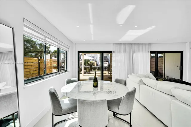 a kitchen with granite countertop cabinets stainless steel appliances and counter space
