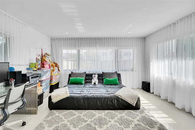 a bathroom with a toilet sink and shower