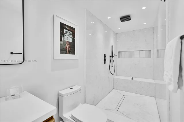 a view of swimming pool from a balcony