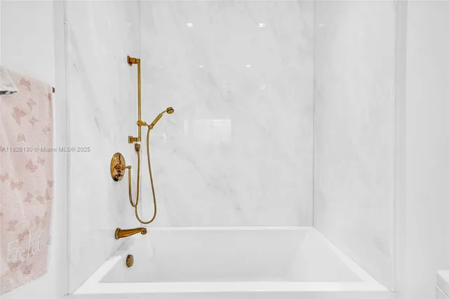 an aerial view of a city with lake view