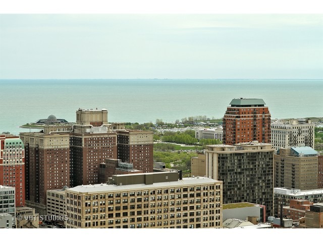 235 West Van Buren Street, Unit 4606 Chicago, IL 60607 - Photo 15 of 22 a view of a city with tall buildings