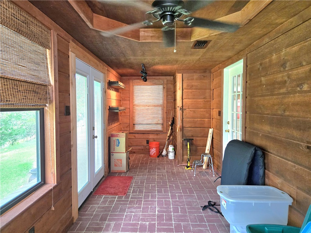 219 Ripple Creek Lane Somerville, TX 77879 - Photo 28 of 40 a lobby with furniture and floor to ceiling window