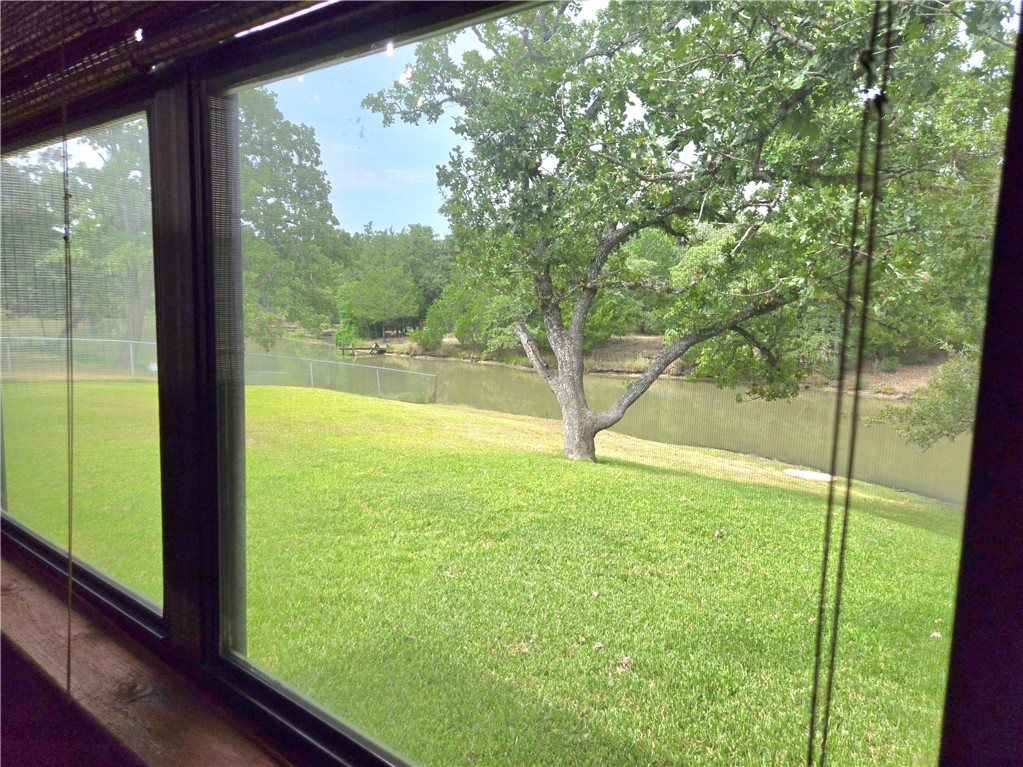 219 Ripple Creek Lane Somerville, TX 77879 - Photo 30 of 40 a view of an outdoor space and deck