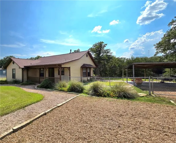 a view of a house with a swimming pool