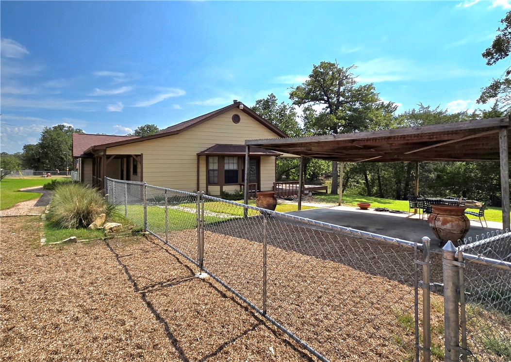 219 Ripple Creek Lane Somerville, TX 77879 - Photo 7 of 40 a view of a house with a swimming pool