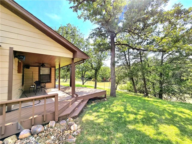 a view of swimming pool with a patio
