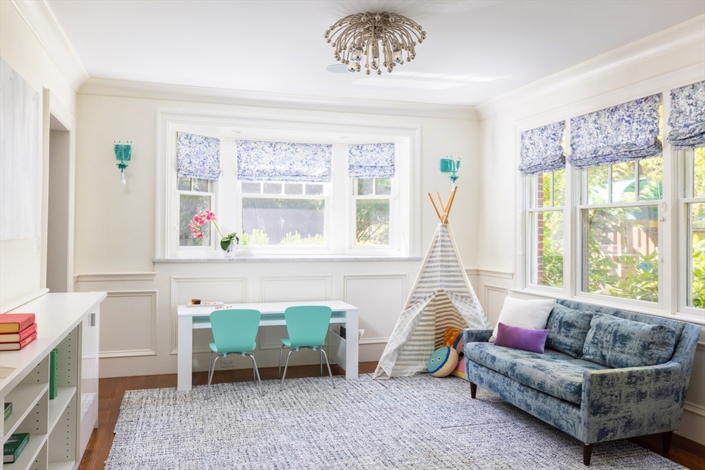 1004 Centre Street Newton, MA 02459 - Photo 17 of 34 a living room with furniture and a window