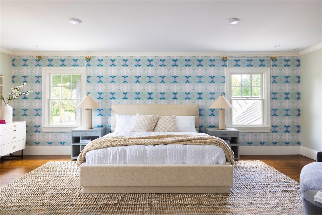 1004 Centre Street Newton, MA 02459 - Photo 18 of 34 a spacious bedroom with a bed and window