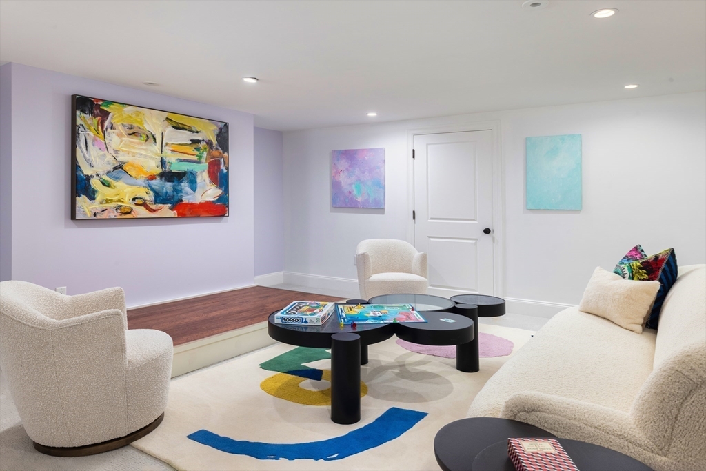 1004 Centre Street Newton, MA 02459 - Photo 26 of 34 a living room with furniture and a wooden floor