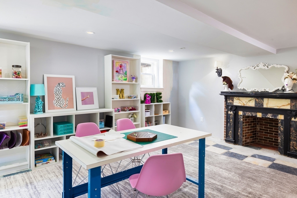 1004 Centre Street Newton, MA 02459 - Photo 27 of 34 a view of a dining room with furniture and a kitchen