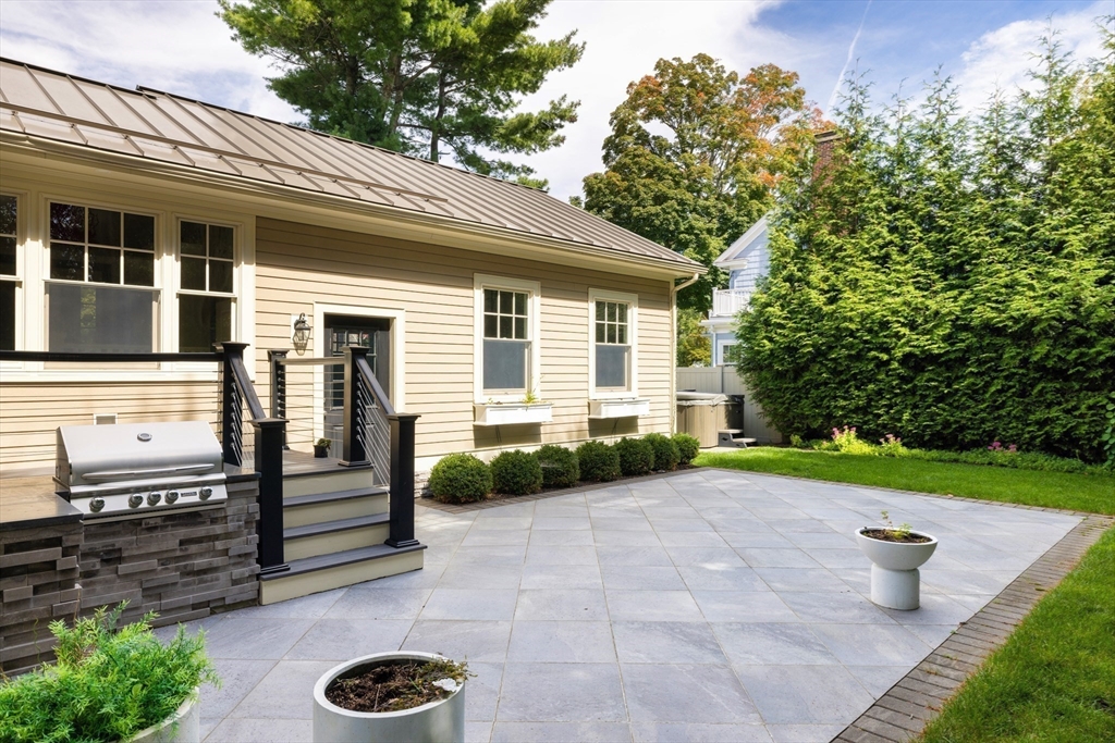 1004 Centre Street Newton, MA 02459 - Photo 28 of 34 a view of a house with backyard and sitting area