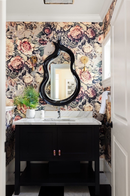 1004 Centre Street Newton, MA 02459 - Photo 9 of 34 a bathroom with a sink and a mirror