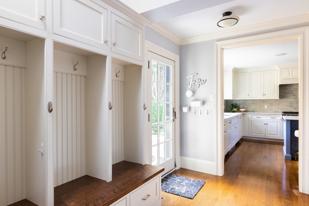 1004 Centre Street Newton, MA 02459 - Photo 10 of 34 a bathroom with a granite countertop sink and a mirror