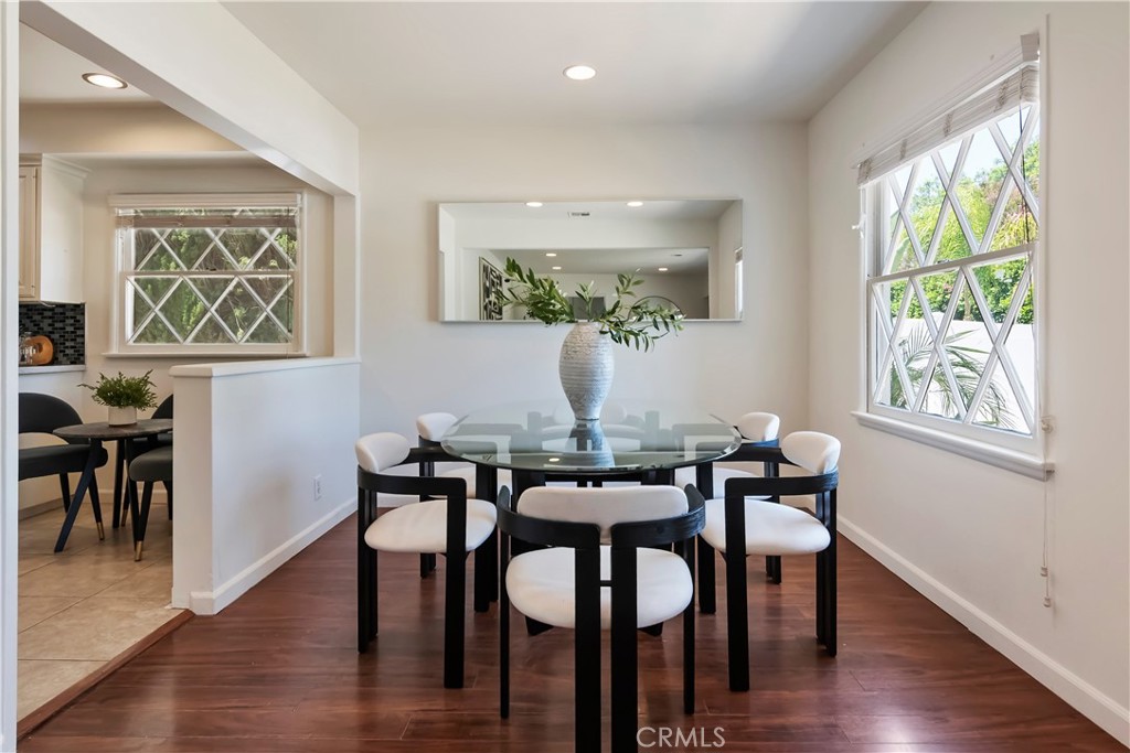 16828 Margate Street Encino, CA 91436 - Photo 5 of 21 a view of a dining room with furniture window and wooden floor