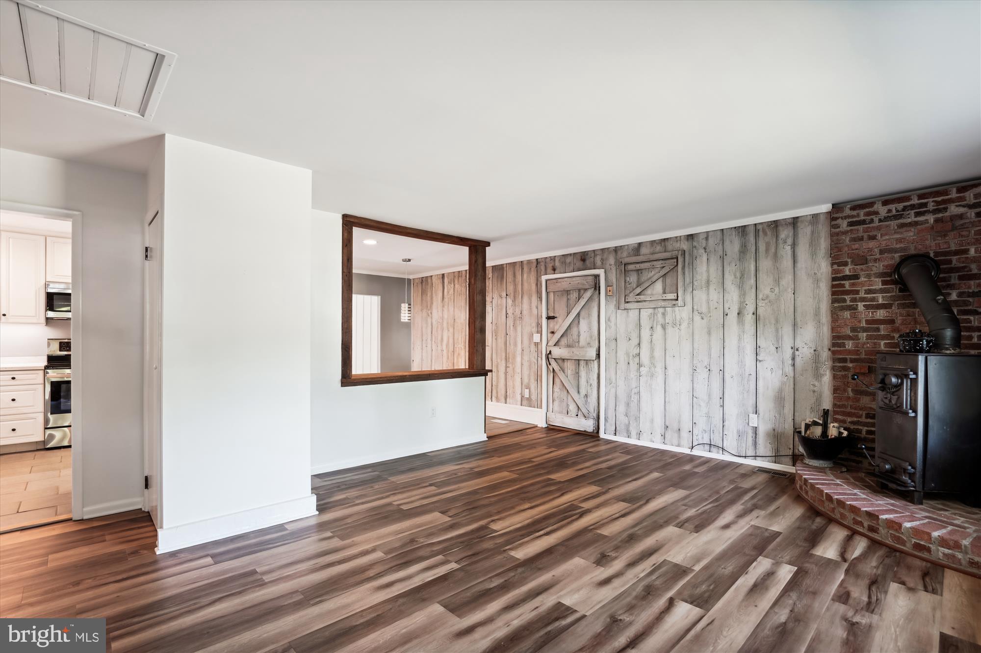 7305 Station Road Newcomb, MD 21653 - Photo 6 of 21 Living room with pass-through to kitchen