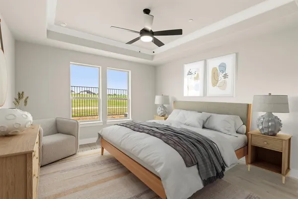 a bedroom with a bed furniture and a window