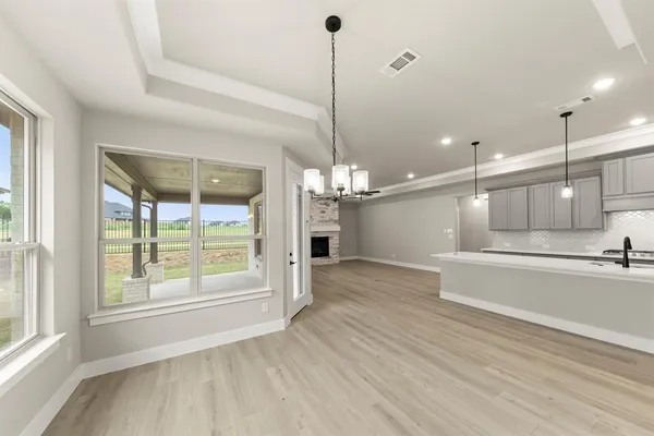 a view of a kitchen and a chandelier