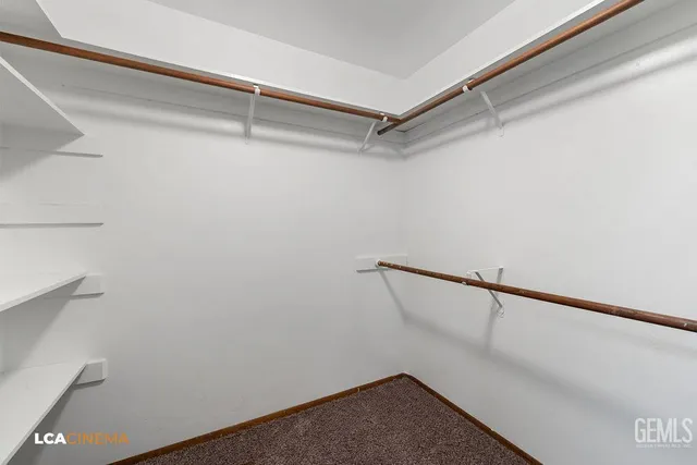 a view of a room with racks on the wall