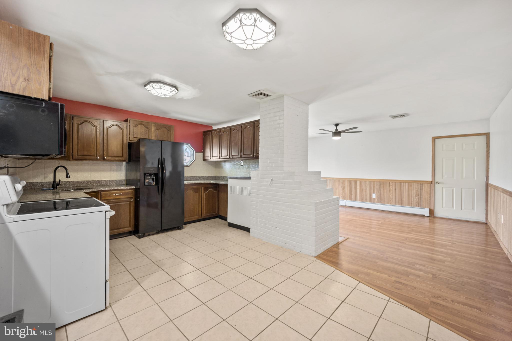 26 Balsam Road Levittown, PA 19057 - Photo 8 of 32 Kitchen view to living room