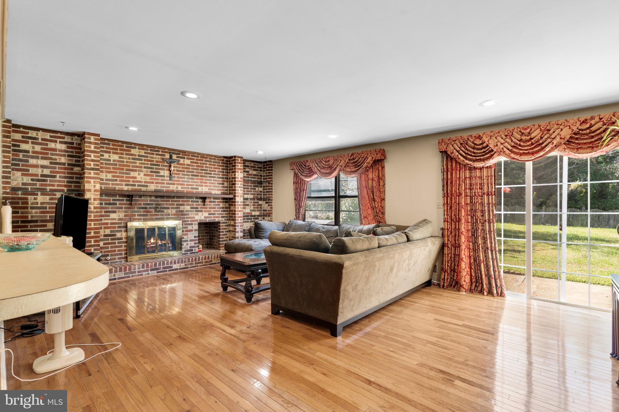 2 West High Ridge Road Cherry Hill, NJ 08003 - Photo 14 of 42 a living room with furniture and a large window