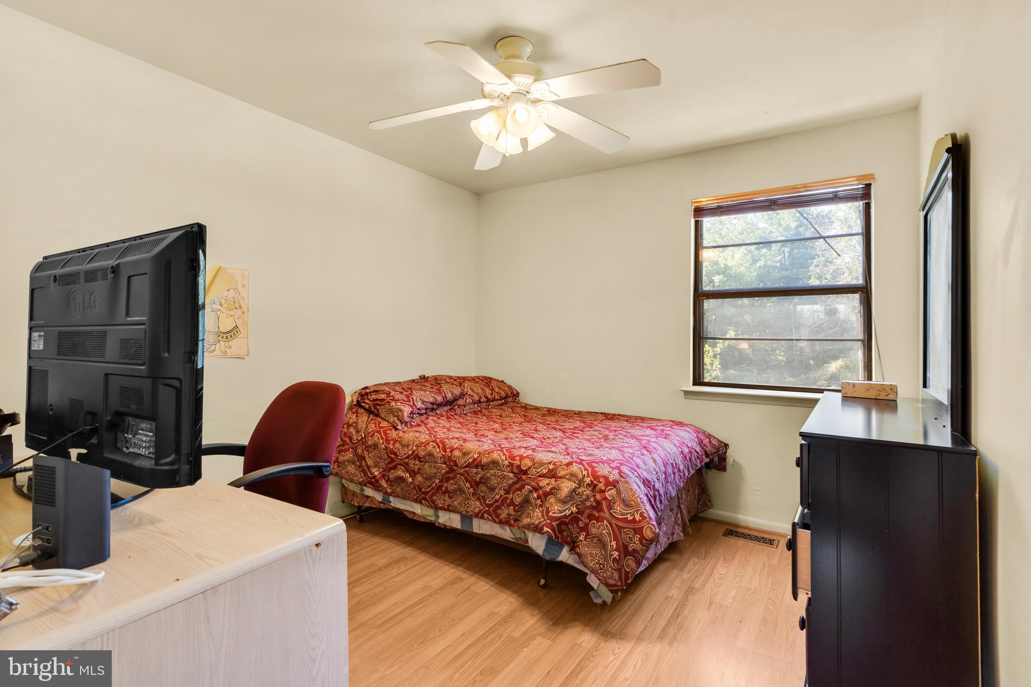 2 West High Ridge Road Cherry Hill, NJ 08003 - Photo 26 of 42 a bedroom with a bed and wooden floor