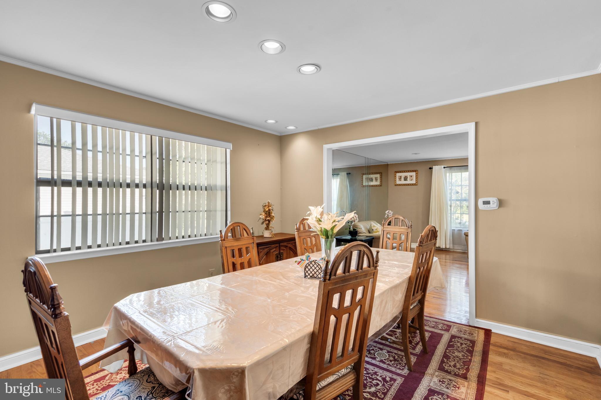 2 West High Ridge Road Cherry Hill, NJ 08003 - Photo 8 of 42 a view of a a dining room with furniture window and wooden floor