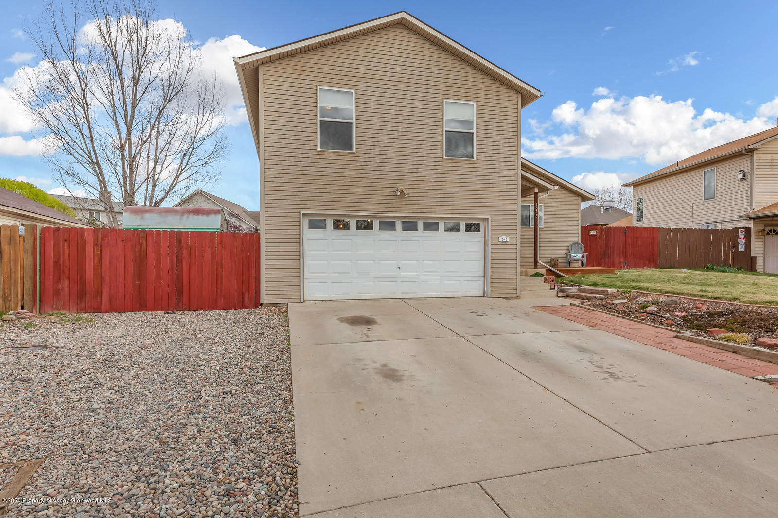 1543 Beech Street Rifle, CO 81650 - Photo 2 of 20 a view of front of house with a yard