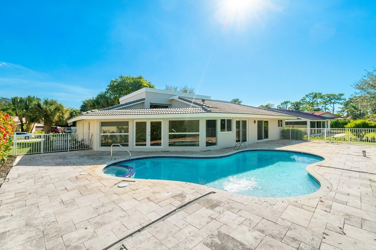 914 Foxpointe Circle Delray Beach, FL 33445 - Photo 18 of 19 a front view of a house with a yard